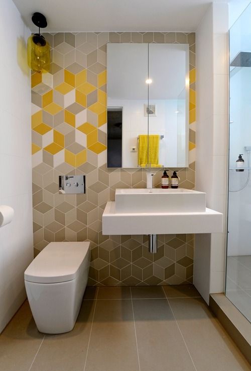 azulejos amarelos no banheiro