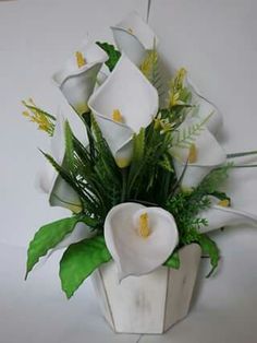 arranjos de flores de eva copo de leitee