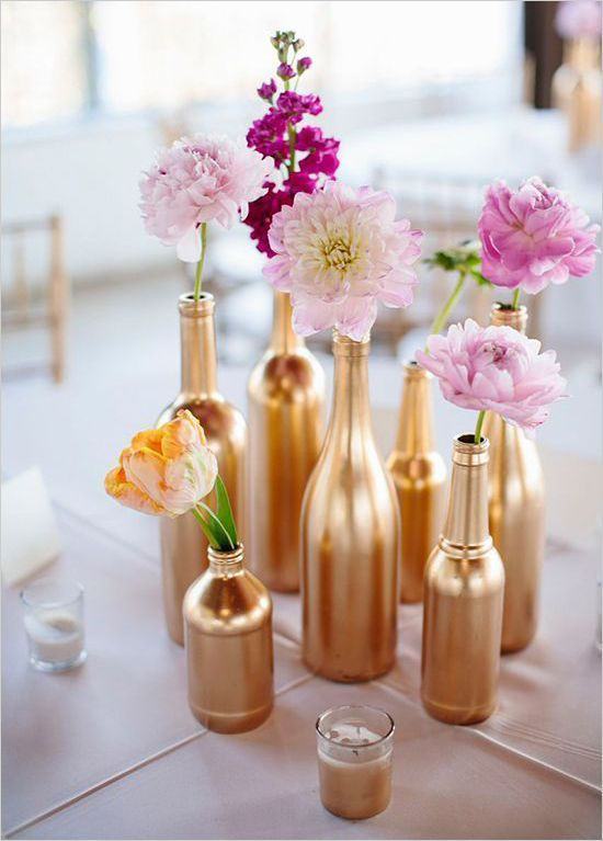 Arranjos de mesa bodas de ouro com flores
