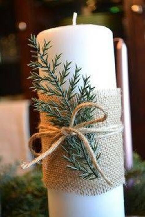 Vela decorada artesanalmente com ramo de folha barbante e tecido