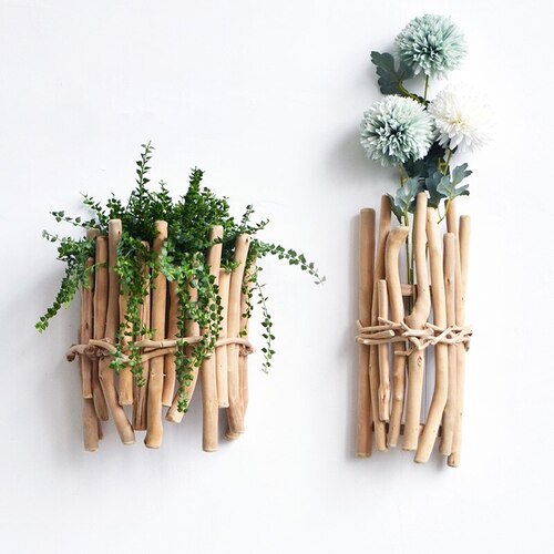 Porta plantas artesanal com galhos de madeira